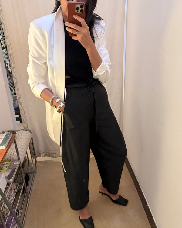 white blazer, sleeves pushed. taffeta pants. done.